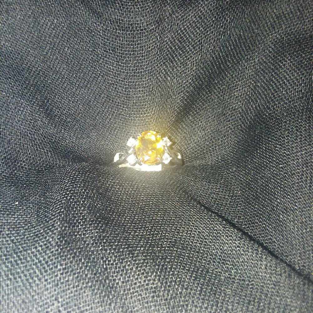 Citrine ring with white topaz on Irodium